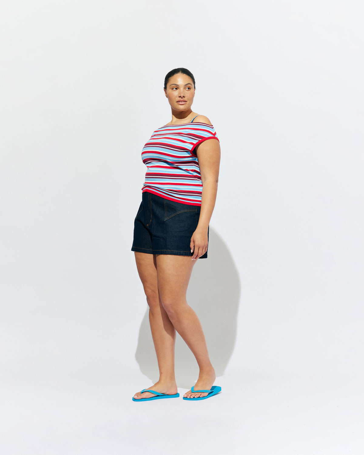 EMMA KNIT TOP POPSICLE STRIPE | Off-shoulder knitted top crafted in a popsicle stripe, mid-weight knit. This top is simple yet fun and can be worn on or off the shoulder.