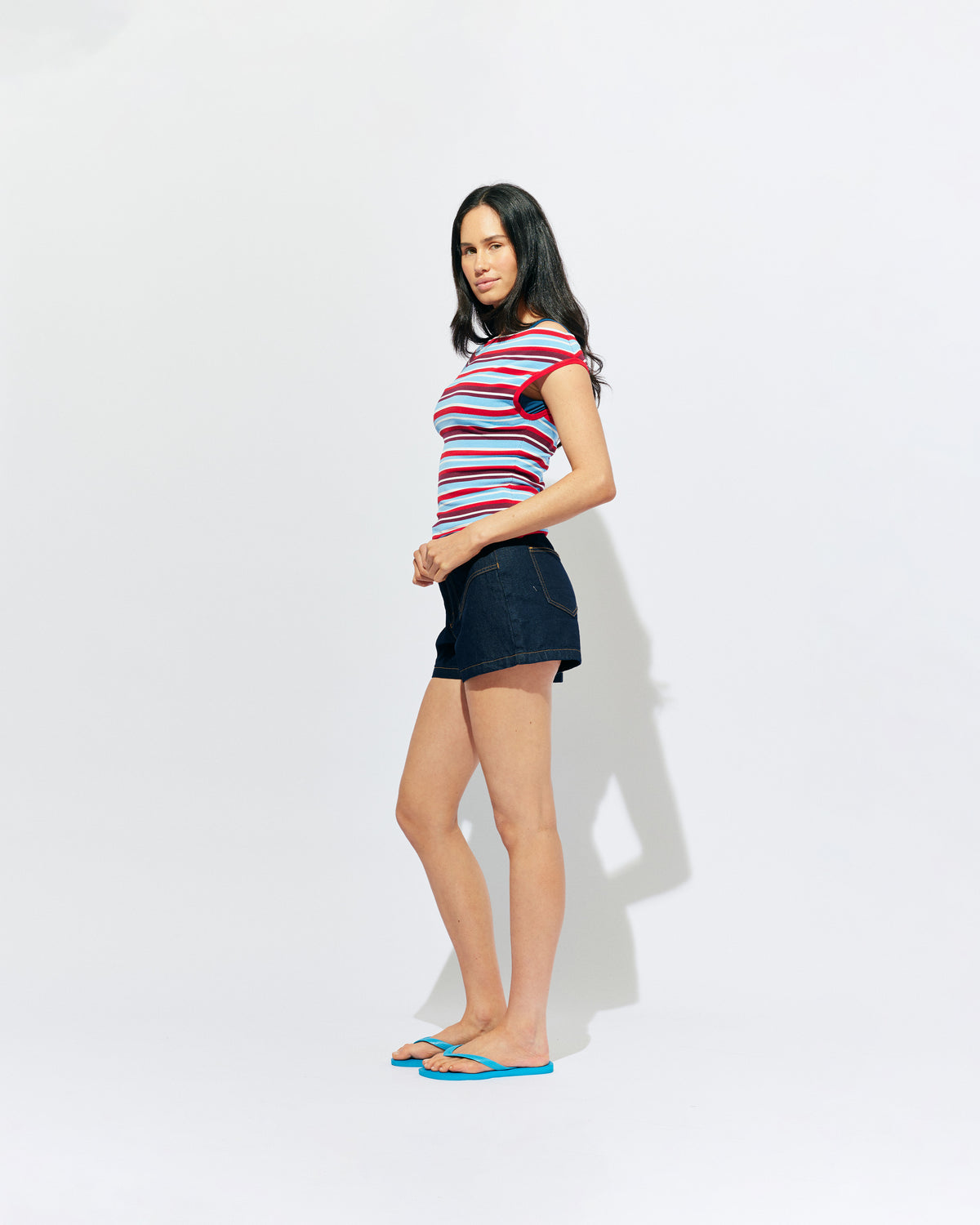 EMMA KNIT TOP POPSICLE STRIPE | Off-shoulder knitted top crafted in a popsicle stripe, mid-weight knit. This top is simple yet fun and can be worn on or off the shoulder.