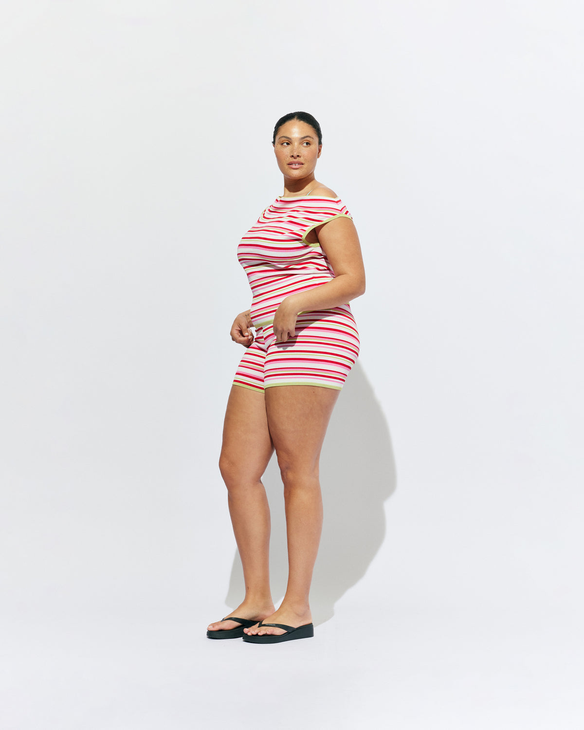 EMMA KNIT TOP STRAWBERRY FIELDS | Off-shoulder knitted top crafted in a strawberry fields mid-weight knit. This top is simple yet fun and can be worn on or off the shoulder.