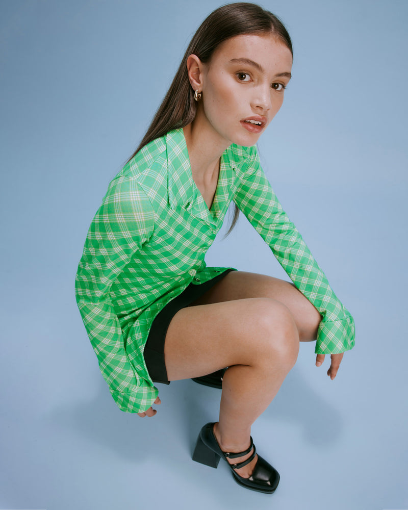 DIME KNIT SHIRT GREEN CHECK | Longsleeve knit shirt with classic shirt collar detailing at the collar and cuffs. Cut in a vibrant green check, this shirt is naturally stretchy and has a beautiful drape.