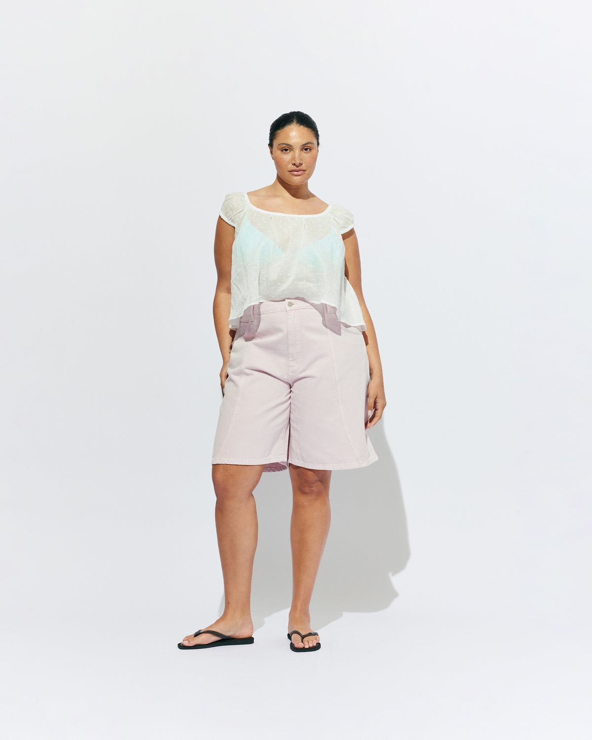 BUZZ SHORT PINK | Our RUBY favourite Buzz Jeans, now available in shorts. Designed in a soft pink denim, these mid-rise shorts have a longer length fit and a barrel leg shape, making them perfect for any summer occasion. 