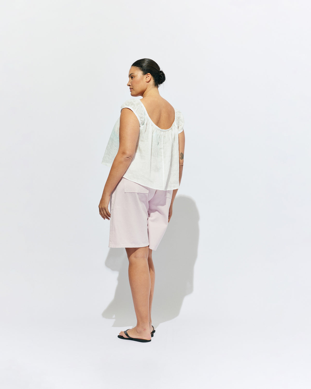 BUZZ SHORT PINK | Our RUBY favourite Buzz Jeans, now available in shorts. Designed in a soft pink denim, these mid-rise shorts have a longer length fit and a barrel leg shape, making them perfect for any summer occasion. 