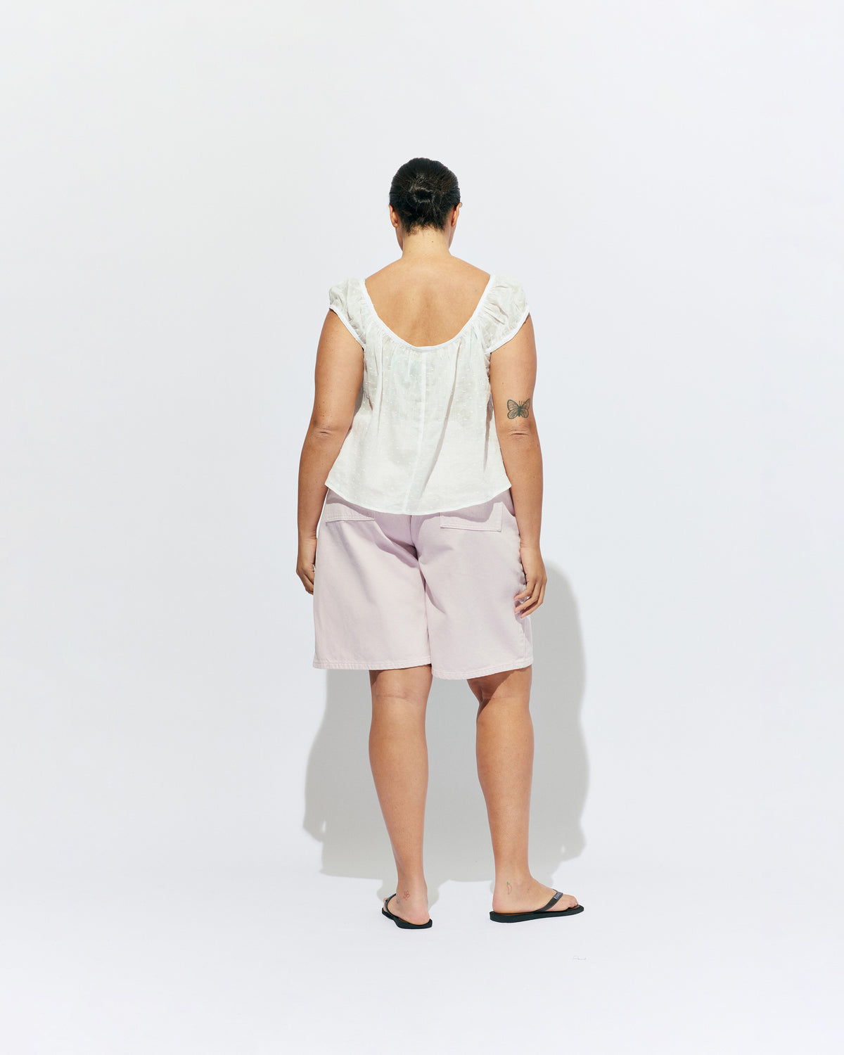 BUZZ SHORT PINK | Our RUBY favourite Buzz Jeans, now available in shorts. Designed in a soft pink denim, these mid-rise shorts have a longer length fit and a barrel leg shape, making them perfect for any summer occasion. 