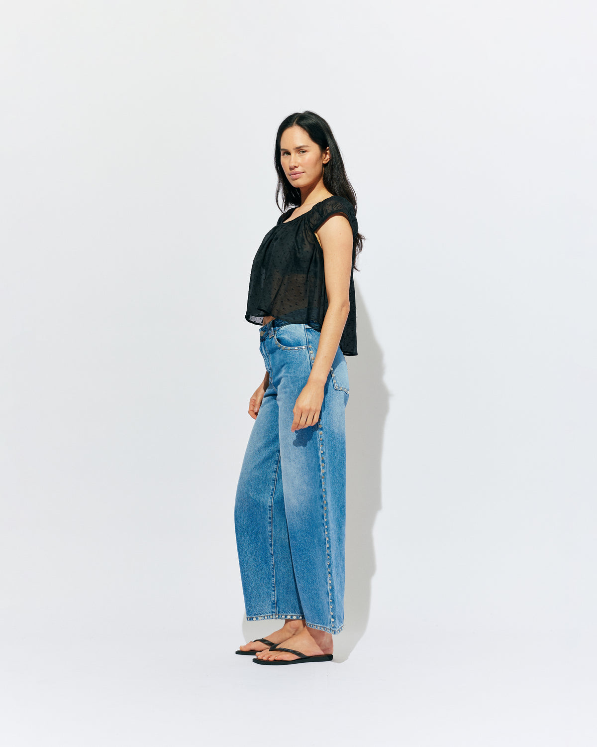 ICON STUDDED JEAN MIDTOWN BLUE | Barrel-leg jean designed in our signature midtown blue wash denim with studded seams. Sits mid to high-waisted with classic 5 pocket and waistband detailing. An updated version of our Icon Jean.