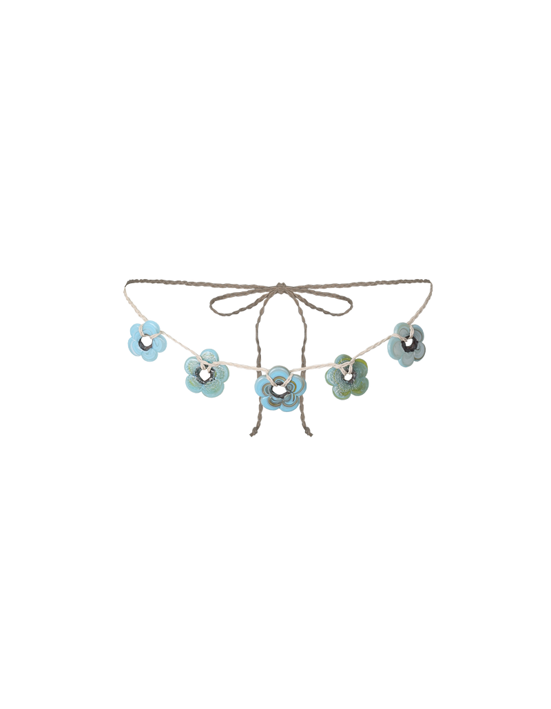 GRACE BELT NATURAL MULTI | Floral glass pendant belt with a hemp cord, designed to wear on your waist or your hips. Wear over skirts, dresses or tied through your favourite denim or trouser loops. Each glass Flora piece is...