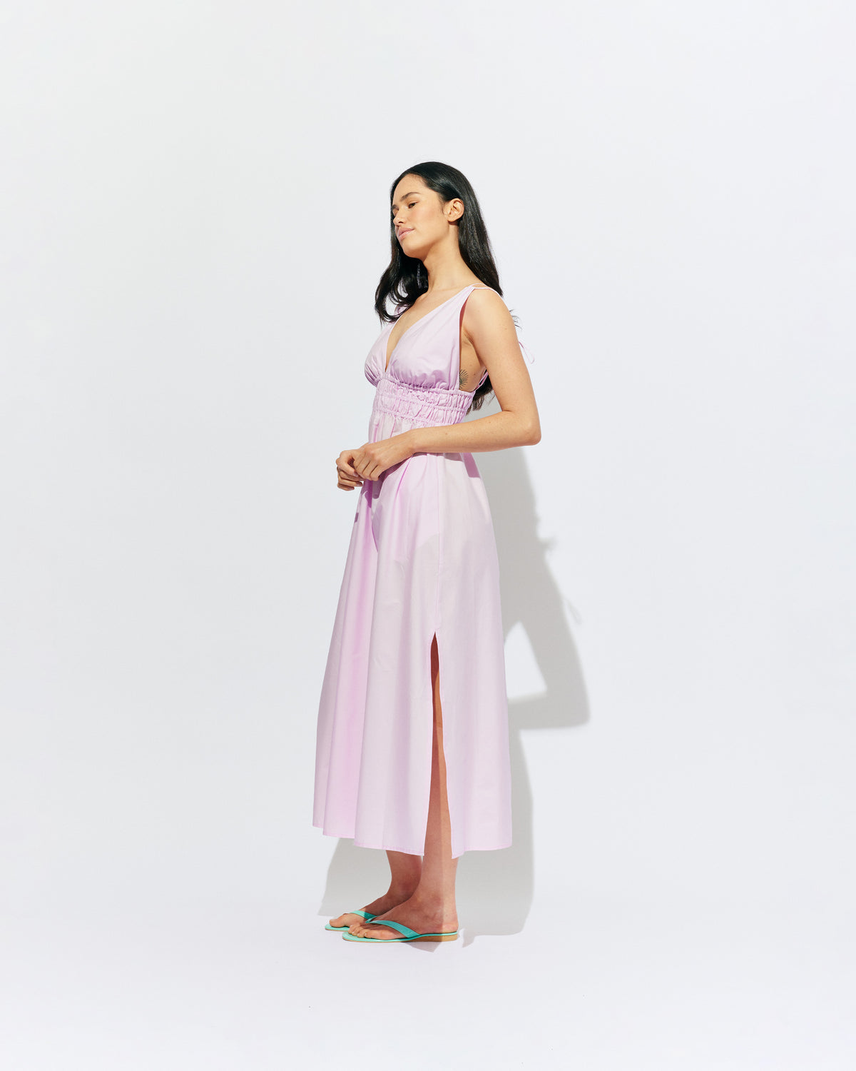 HERO MAXI DRESS SOFT PINK | Double strap maxi dress with a plunge neckline, shirred waist detail, and side split in a pink organic cotton. A Rubette favourite for any occasion, from weddings to workwear and more.