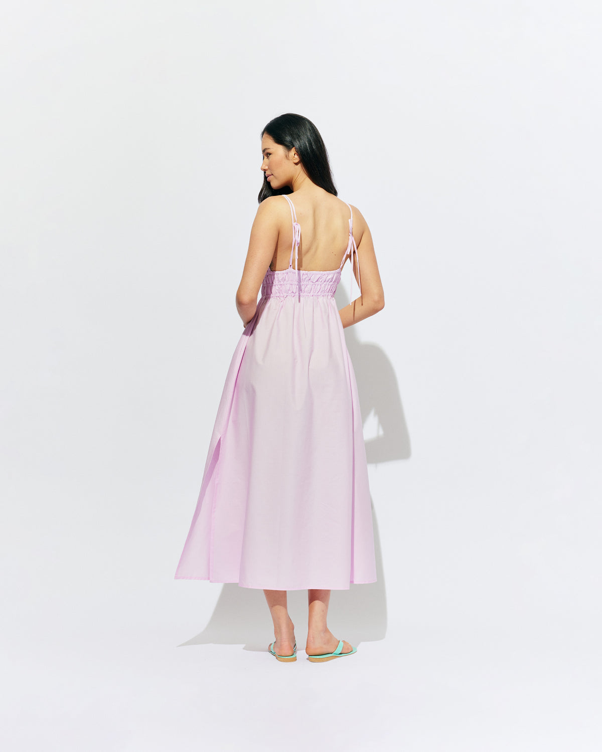 HERO MAXI DRESS SOFT PINK | Double strap maxi dress with a plunge neckline, shirred waist detail, and side split in a pink organic cotton. A Rubette favourite for any occasion, from weddings to workwear and more.