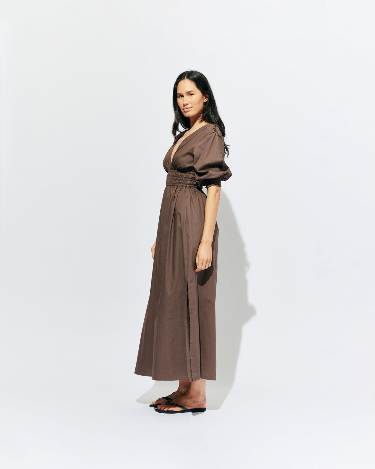 HERO PUFF SLEEVE MAXI DRESS BROWN | An update to our Hero Maxi Dress, this puff sleeve maxi dress features a plunge neckline, shirred waist detail, and side split in a brown organic cotton. A Rubette favourite for any occasion, from weddings to workwear and more.