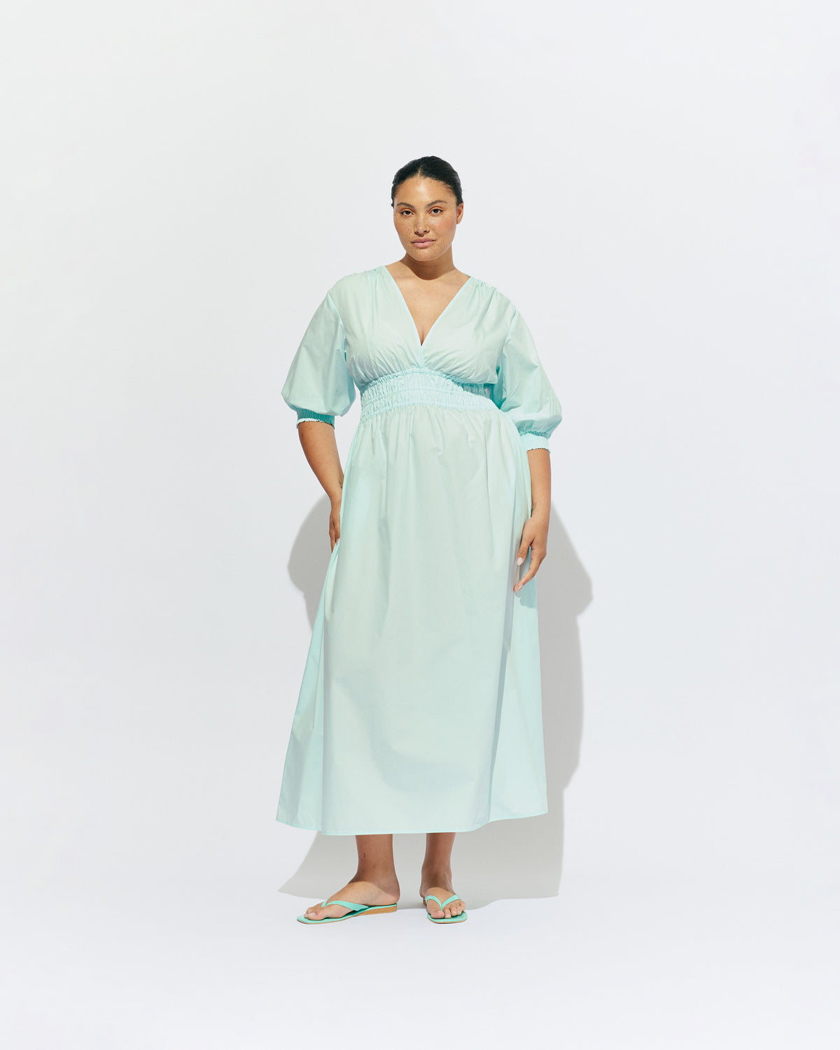 HERO PUFF SLEEVE MAXI DRESS MINT JULEP | An update to our Hero Maxi Dress, this puff sleeve maxi dress features a plunge neckline, shirred waist detail, and side split in a mint julep organic cotton. A Rubette favourite for any occasion, from weddings to workwear and more.