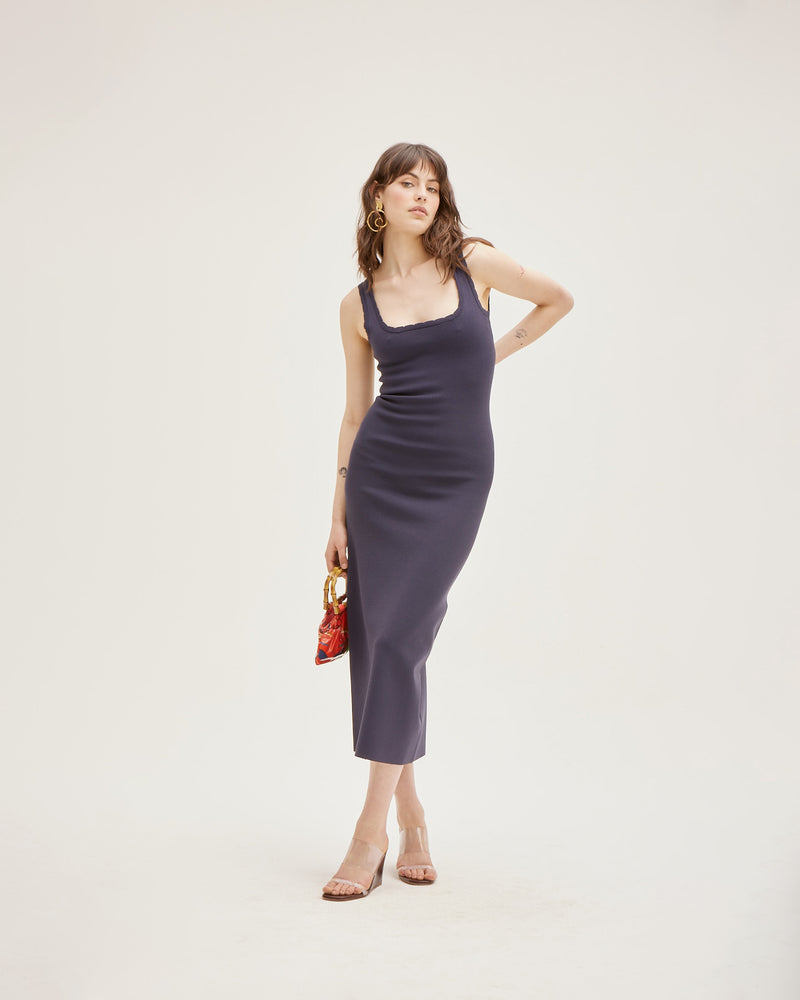 IMA DRESS MIDNIGHT | Sleeveless maxi dress with a square neckline and scallop edging throughout, made in a medium weight midnight coloured rib knit. Designed for a close fit that hugs you in all...