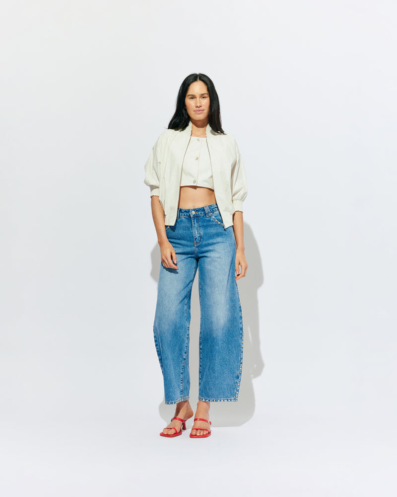 JOEY BOMBER CREAM | Statement jacket and tank combined, designed in a cream colourway organic cotton. Featuring cropped sleeves, gathered detailing and a bomber style fit jacket, which overlay a built-in cropped top. Pair this jacket with denim for an elevated everyday look. 
