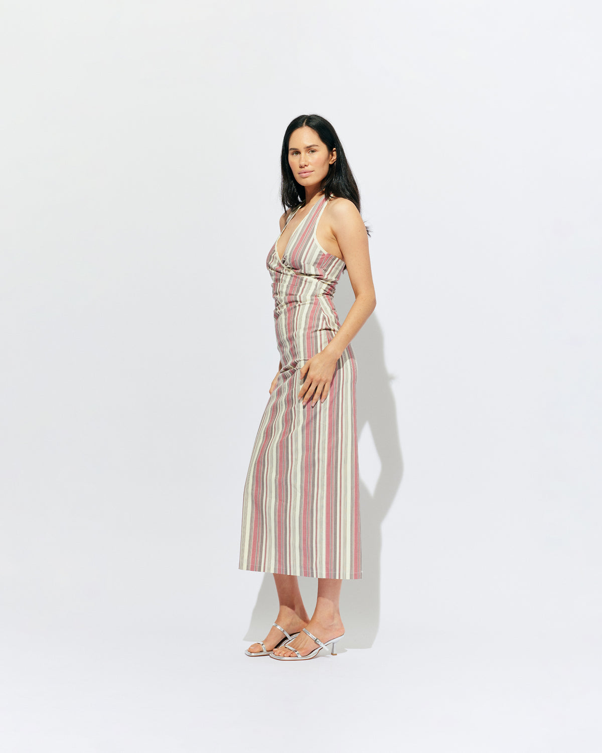 JOEY DRESS ANASE STRIPE | Bias cut midi dress with a tie-up halter neckline, crafted in our anase stripe organic cotton. Designed with ruching details on the waist and back for a tailored fit through the body, which falls into a straight cut skirt with...