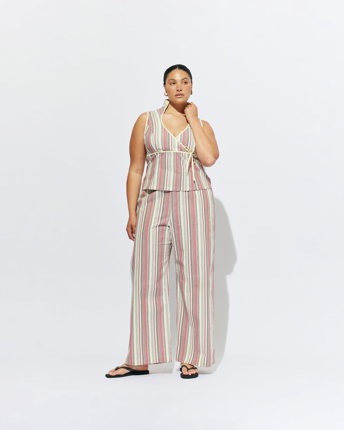 SONNY PANT ANASE STRIPE | Straight leg cotton pant with a flat elastic waistband, designed in our anase striped cotton. These pants sit relaxed and wide and have side and back pockets, with a feature embroidered RUBY 'R' on the back pocket. Make it a...