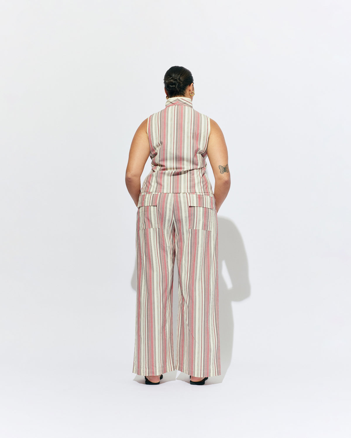 SONNY PANT ANASE STRIPE | Straight leg cotton pant with a flat elastic waistband, designed in our anase striped cotton. These pants sit relaxed and wide and have side and back pockets, with a feature embroidered RUBY 'R' on the back pocket. Make it a...