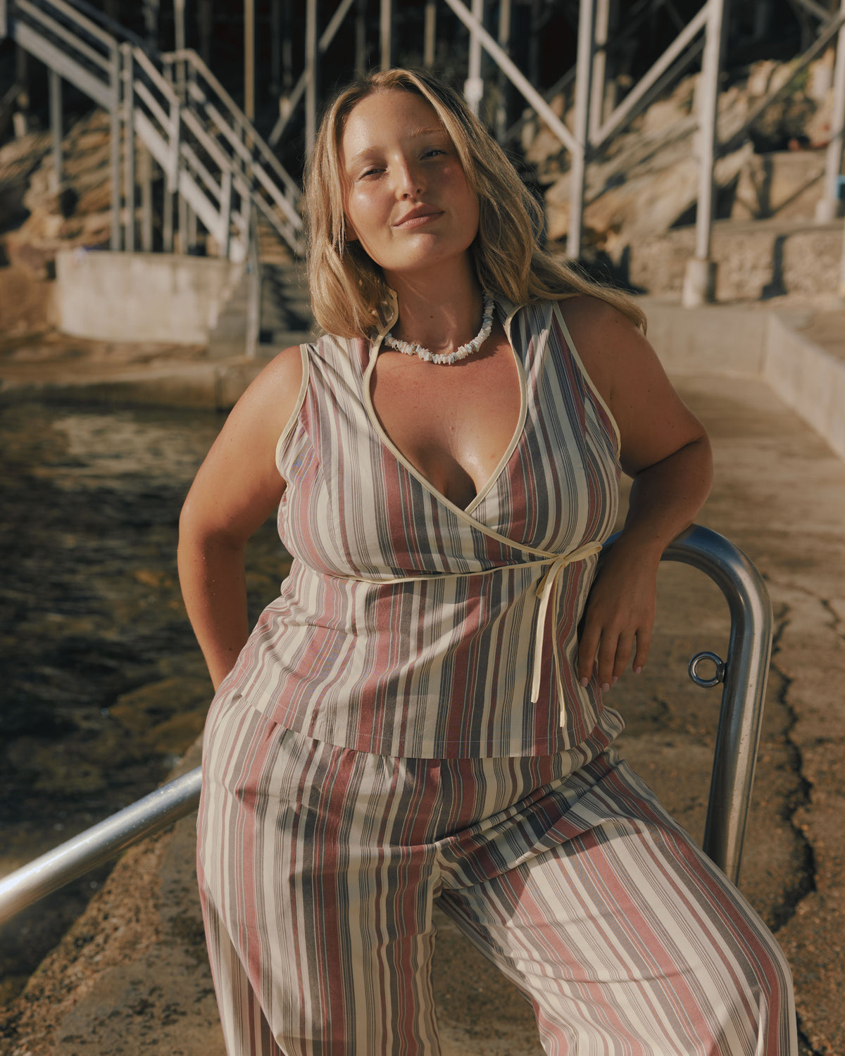 SONNY PANT ANASE STRIPE | Straight leg cotton pant with a flat elastic waistband, designed in our anase striped cotton. These pants sit relaxed and wide and have side and back pockets, with a feature embroidered RUBY 'R' on the back pocket. Make it a...