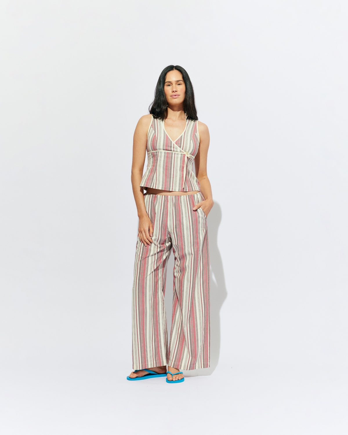 SONNY PANT ANASE STRIPE | Straight leg cotton pant with a flat elastic waistband, designed in our anase striped cotton. These pants sit relaxed and wide and have side and back pockets, with a feature embroidered RUBY 'R' on the back pocket. Make it a...