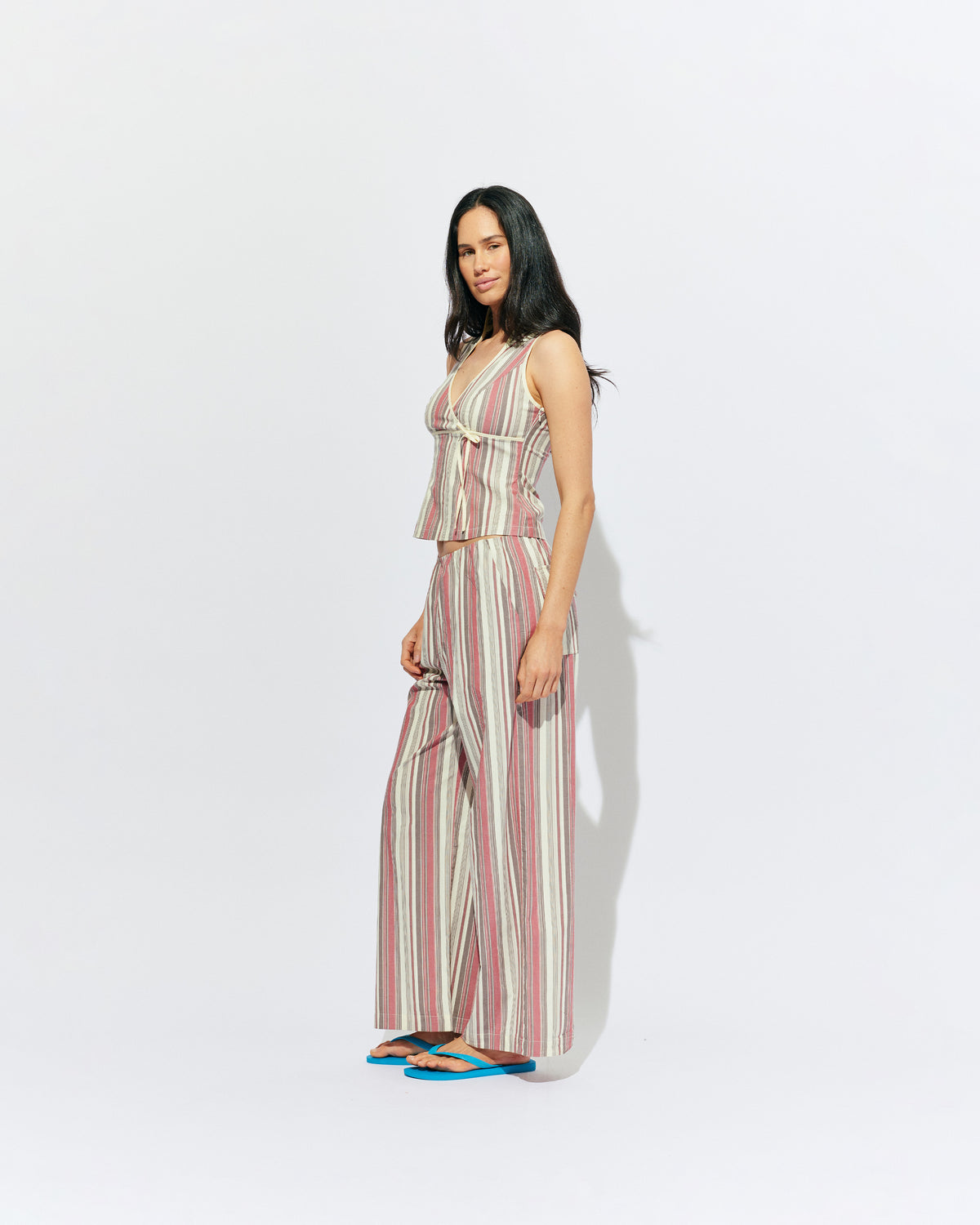 SONNY PANT ANASE STRIPE | Straight leg cotton pant with a flat elastic waistband, designed in our anase striped cotton. These pants sit relaxed and wide and have side and back pockets, with a feature embroidered RUBY 'R' on the back pocket. Make it a...