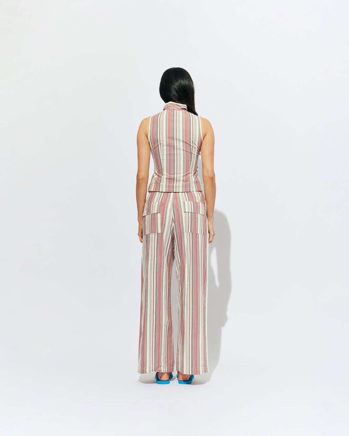 SONNY PANT ANASE STRIPE | Straight leg cotton pant with a flat elastic waistband, designed in our anase striped cotton. These pants sit relaxed and wide and have side and back pockets, with a feature embroidered RUBY 'R' on the back pocket. Make it a...