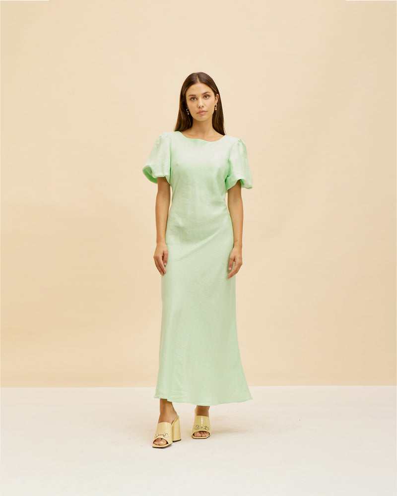 KENDALL LINEN DRESS MINT | Bias cut dress with a subtle puff sleeve and cut out back with neck-ties. Cut in a mint linen, this piece is designed to perfectly skim over your body, while the...