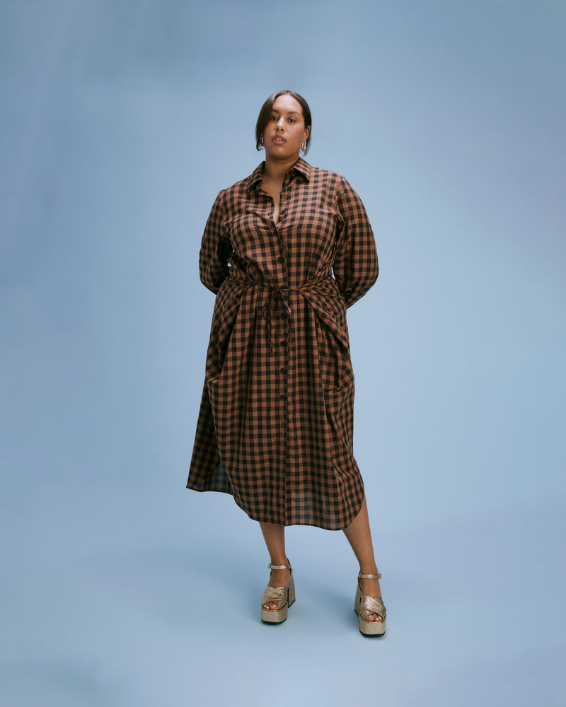 KLEIN GINGHAM WRAP DRESS CHOCOLATE CHECK | Longsleeve shirt dress with front button placket and a wrap waist tie. Designed in a classic shirt silhouette, cut from a neutral toned gingham cotton.