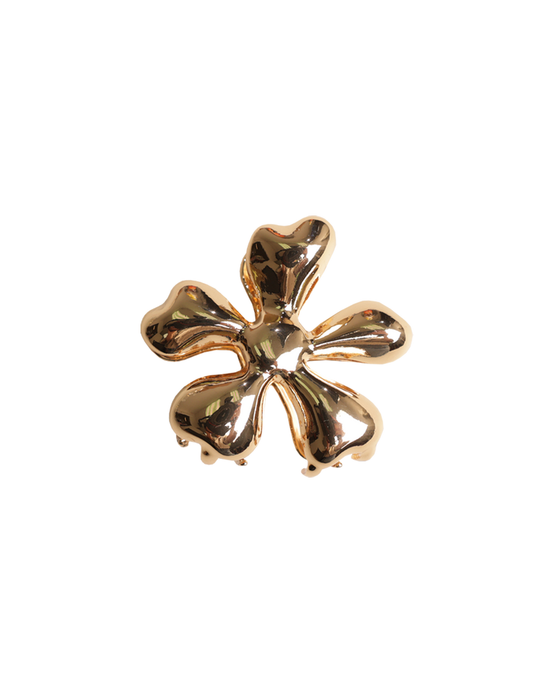 BIG FLOWER HAIR CLAW GOLD | This gold chromatic hair claw, this is a staple accessory for any occasion. Holds a full head of hair and is comfortable enough to wear from morning to night.