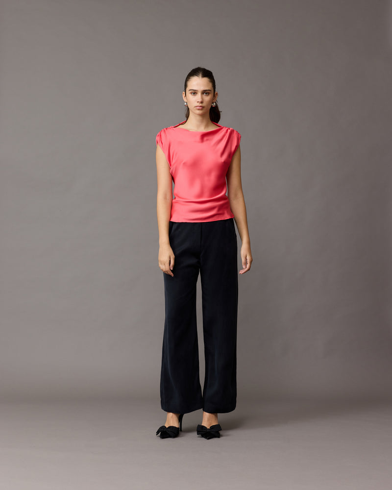 CURTIS SLEEVELESS BLOUSE ROSIE | Bias cut cap sleeve blouse crafted in a rosie coloured satin. This piece has ruched detail at the shoulder, a tie to cinch in the waist, and a high neckline...