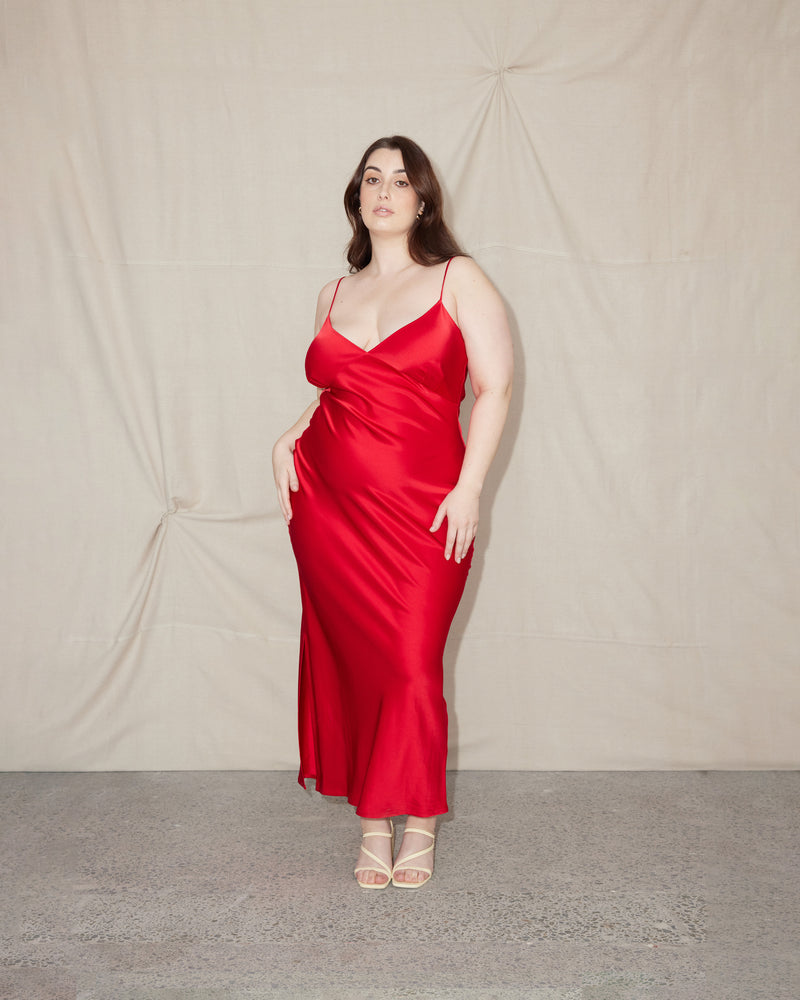 WEIRDLY SLIP LIPPY RED | Iconic bias cut slip dress with plunging neckline in a new longer length. A wardrobe staple in heavy weight double satin that is lush to wear, in a sheeny lippy...
