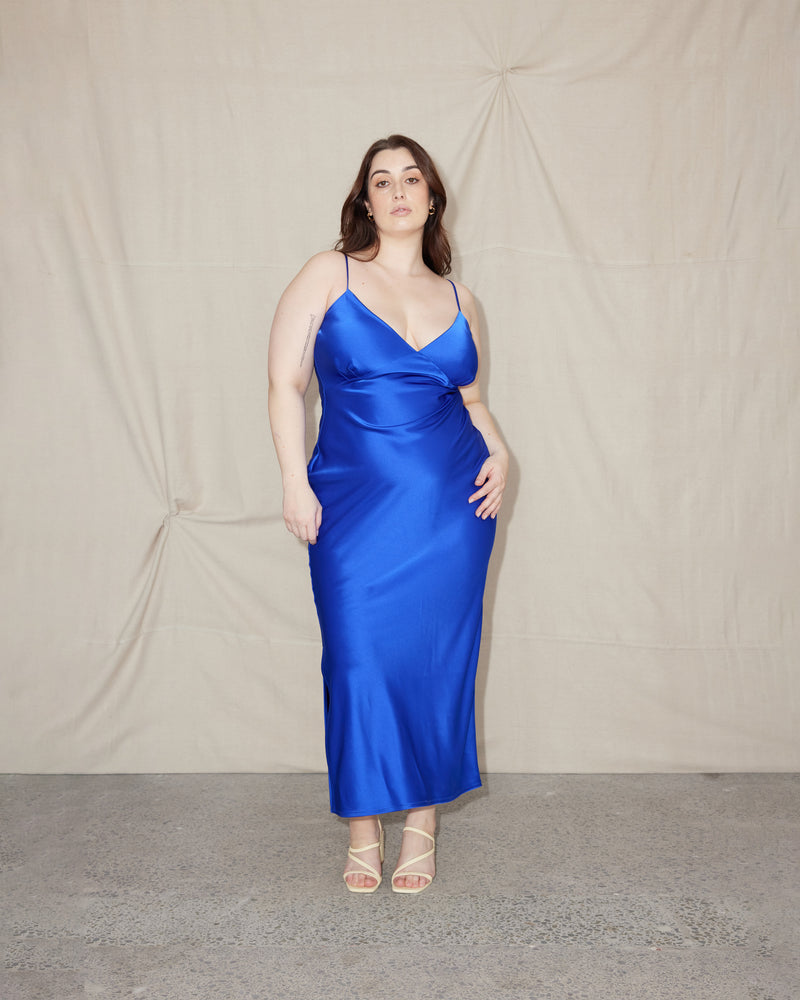 WEIRDLY SLIP ULTRA | Iconic bias cut slip dress with plunging neckline in a new longer length. A wardrobe staple in heavy weight double satin that is lush to wear, in a rich ultra blue shade.