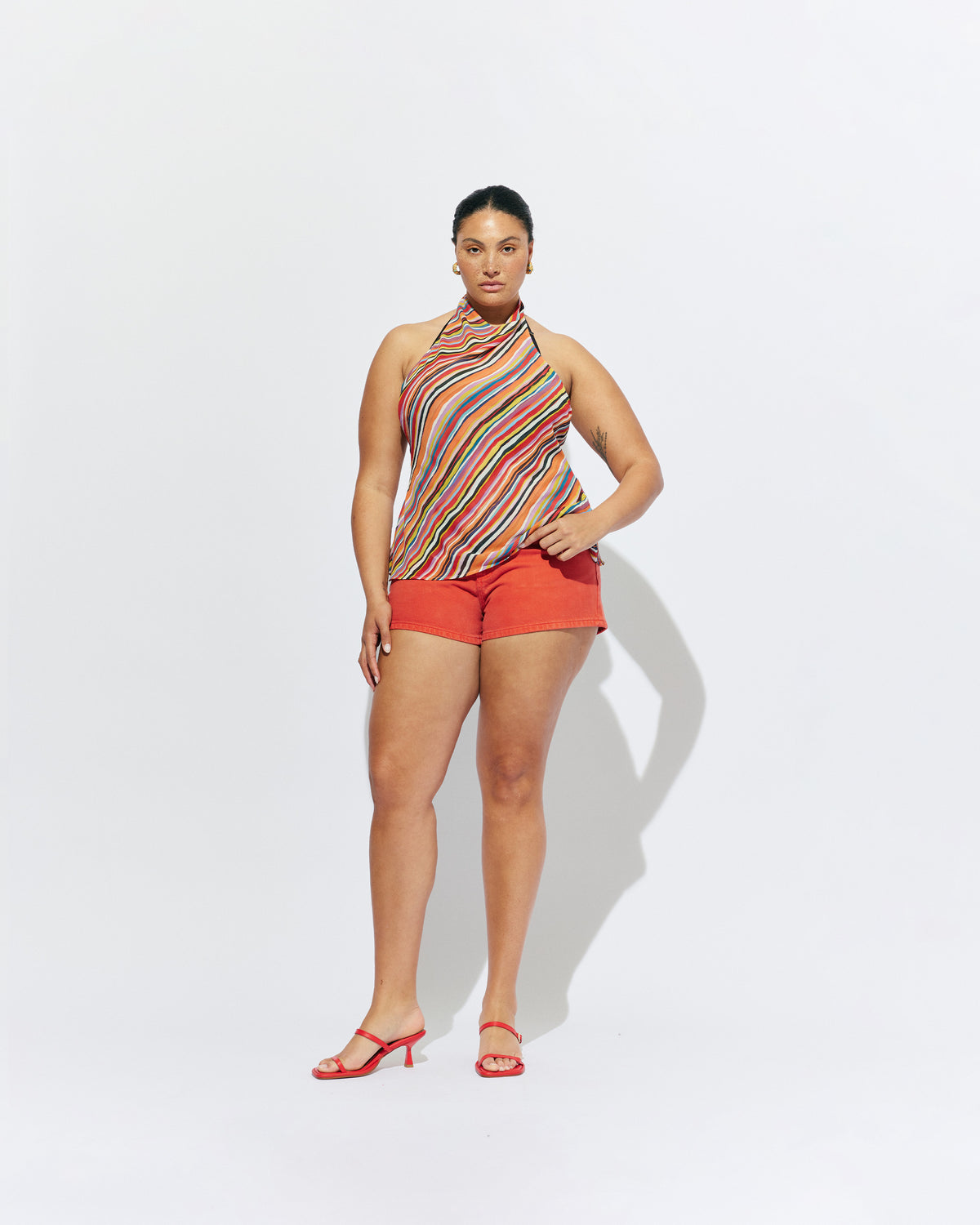 BLINK MICRO SHORT RUST | Micro shorts designed in our rust denim, with a low-rise fit, 5-pocket design and zip fly. An easy summer throw-on short that pairs perfectly with a classic white tee, or lean into the bright colours by pairing it with our...