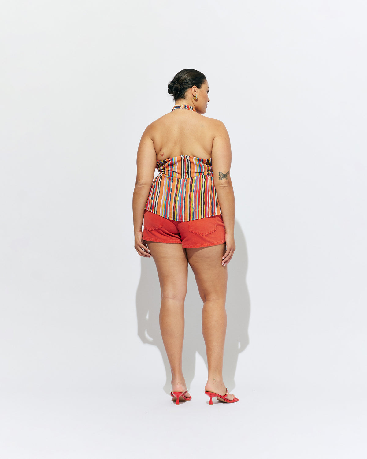 BLINK MICRO SHORT RUST | Micro shorts designed in our rust denim, with a low-rise fit, 5-pocket design and zip fly. An easy summer throw-on short that pairs perfectly with a classic white tee, or lean into the bright colours by pairing it with our...