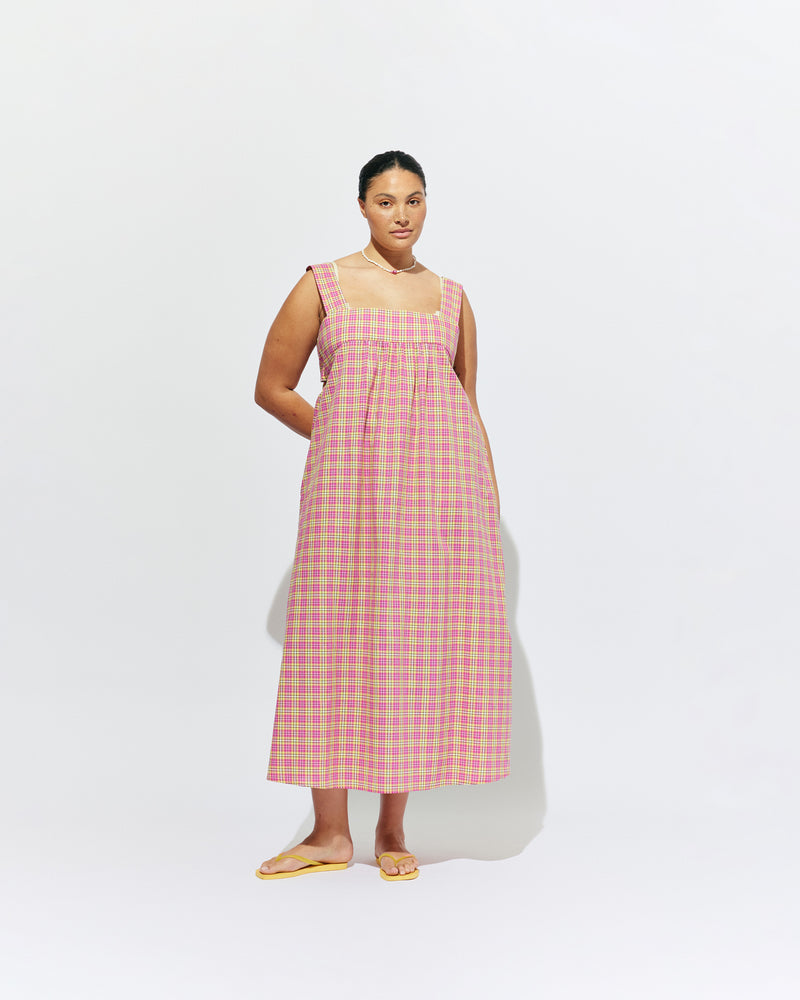 MARGIE TIE-BACK MAXI DRESS PINK YELLOW TARTAN | Versatile maxi dress with a square bust band, pockets and a feature back tie, designed in our organic cotton pink yellow tartan. With a flowy silhouette through the body, this dress will keep you cute and cool in the warmer...