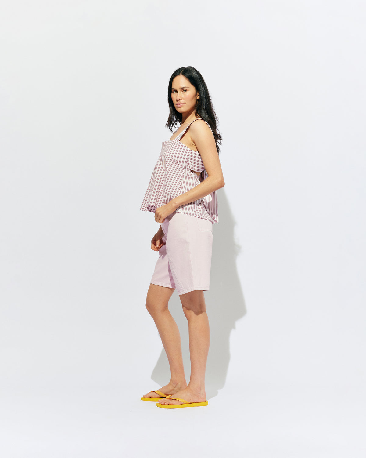 BUZZ SHORT PINK | Our RUBY favourite Buzz Jeans, now available in shorts. Designed in a soft pink denim, these mid-rise shorts have a longer length fit and a wide leg shape, making them perfect for any summer occasion. 