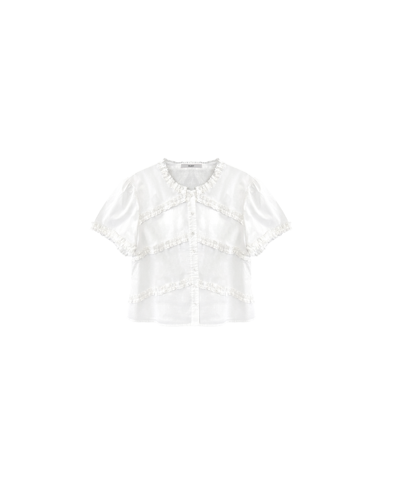 MARTHA BLOUSE WHITE | An update to our Martha Top, this blouse is designed in a semi-sheer organic cotton and features ruffle detailing around the neckline, sleeves and front. Pair with denim for a sweet and simple look. 