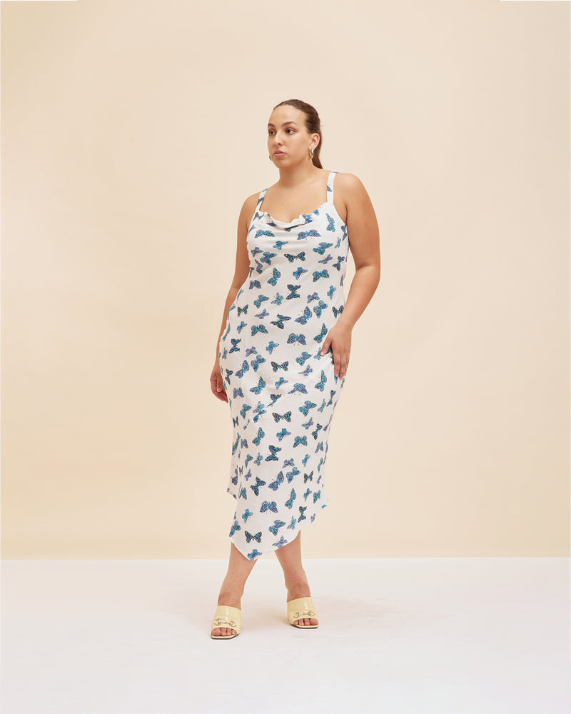 MIA SLIP BUTTERFLY | Cowl neck bias cut slip dress designed in our vintage butterfly print. Features an asymmetrical hem line that compliments the bias cut.
