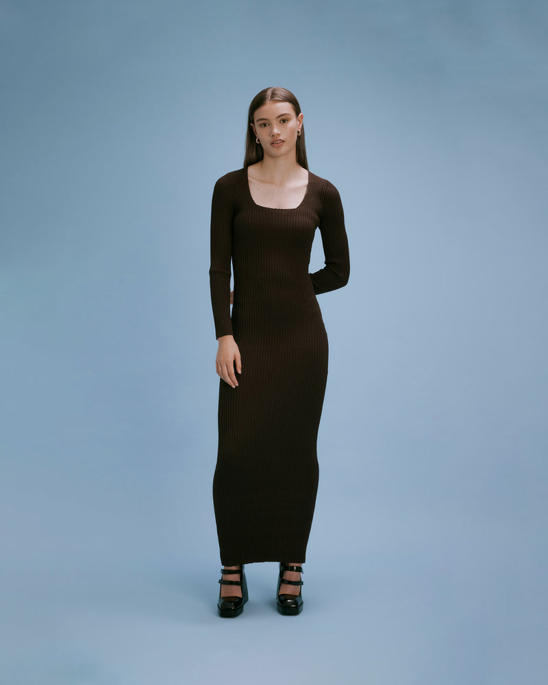 MILANO LONG SLEEVE DRESS JAVA | The Milano Long sleeve Dress is a midi length dress with a flattering square neckline. It is fitted through the body and features ribbed detail throughout with a straight hem....