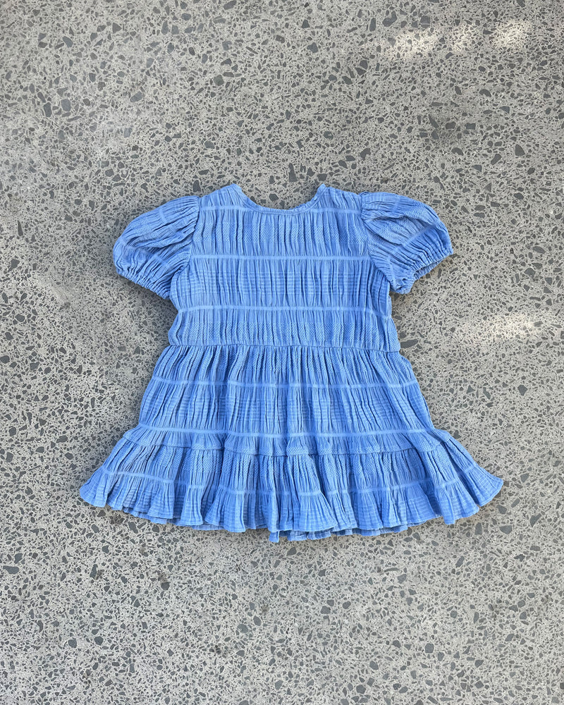 RUBÉBÉ MIRELLA DRESS CORNFLOWER | Our much loved Mirella Prairie Dress makes a return for our Rubébé's! A-line maxi dress that is fitted through the top and continues into an floaty skirt, with a round...