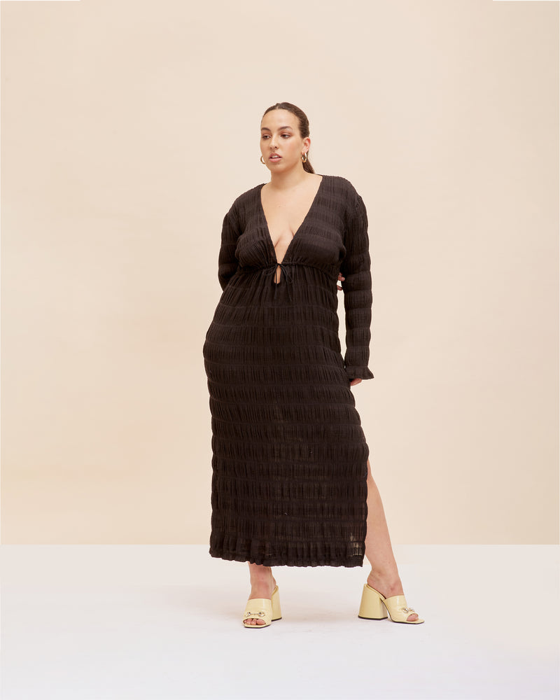 MIRELLA KAFTAN DRESS BLACK | Kaftan style maxi dress featuring a V-neck line, fluted long sleeves and an adjustable drawstring under the bust to create shape. Crafted in our signature Mirella fabric, you can choose...