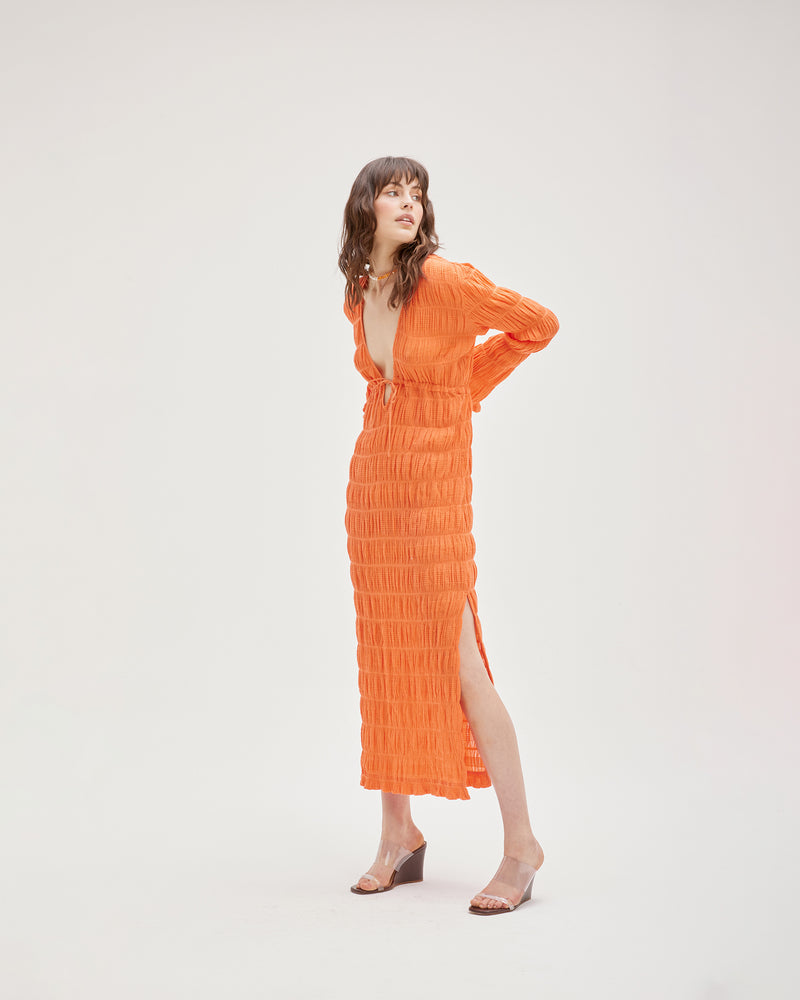 MIRELLA KAFTAN DRESS APEROL | Kaftan style maxi dress featuring a V-neck line, fluted long sleeves and an adjustable drawstring under the bust to create shape. Crafted in our signature Mirella fabric in a new...