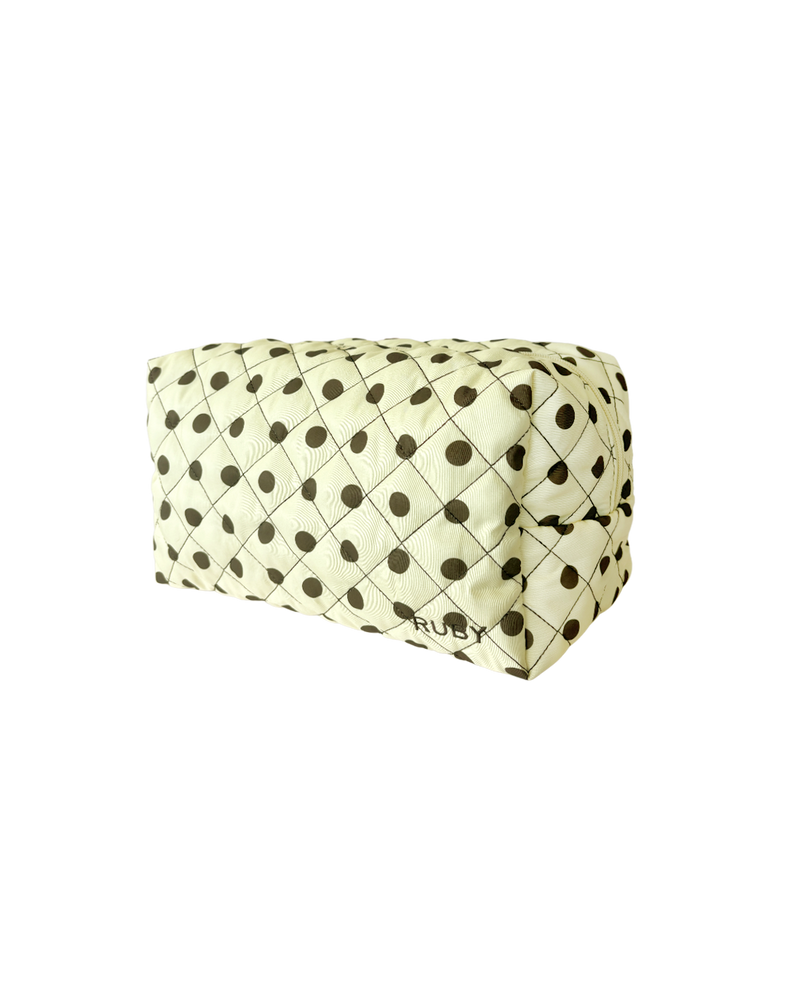 QUILTED TOILETRY BAG BUTTER POLKA DOT | Our very own RUBY Toiletry bag! This bag is quilted and stuffed to provide a comfortable home for all your essentials. Designed in our butter polka dot colourway. 