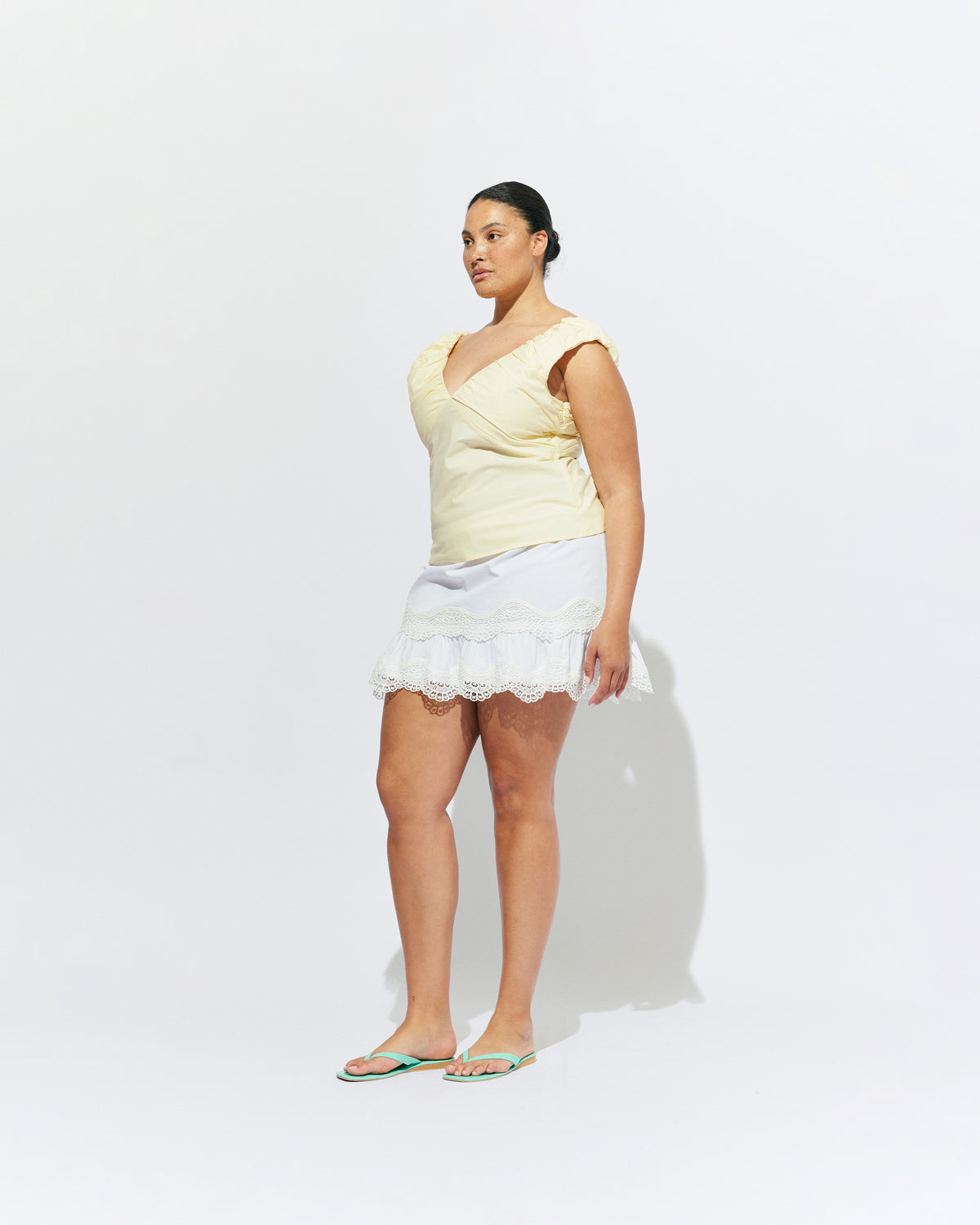 TIDE MINI SKIRT WHITE | A-line mini skirt with broderie trim details, designed in our white organic cotton. With tiered skirt and elastic waistband, this is the perfect everyday skirt to keep you cool in the warmer months. 