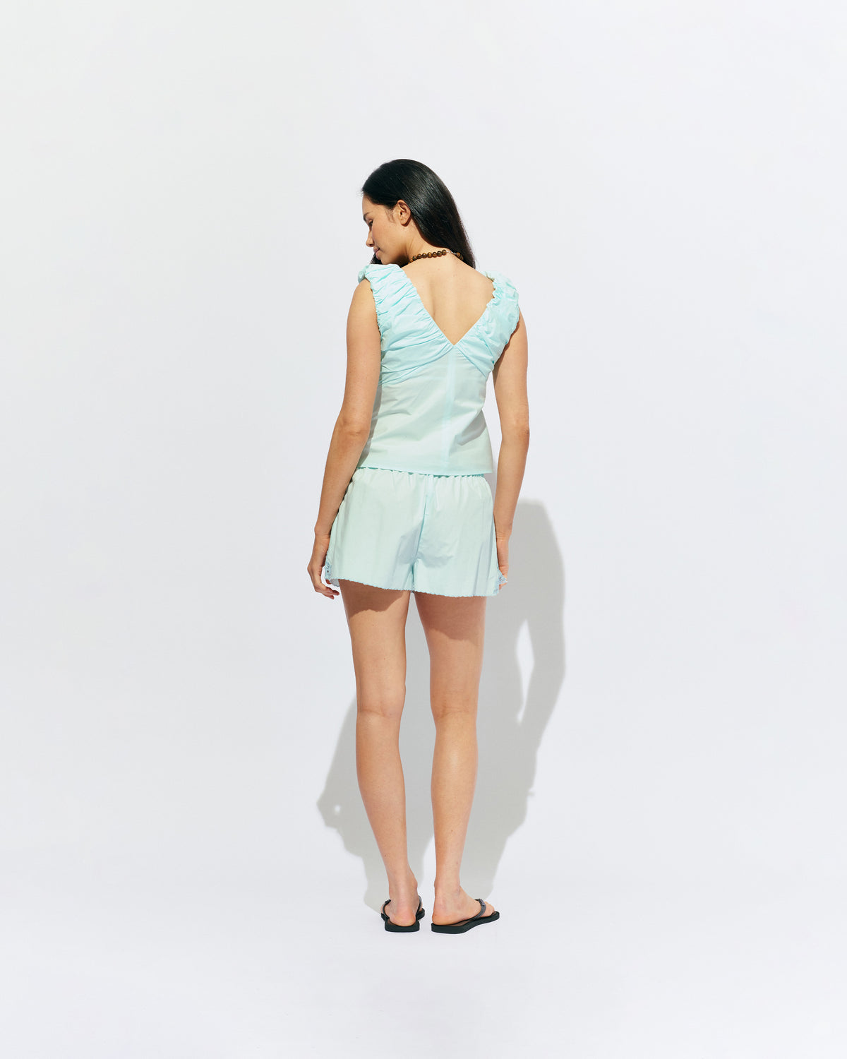CRUSH SHORT MINT JULEP | Low-waisted organic cotton shorts, designed in our mint julep organic cotton. Featuring a scalloped hem and broderie detailing on the sides, pair with your favourite tank for an everyday summer look.