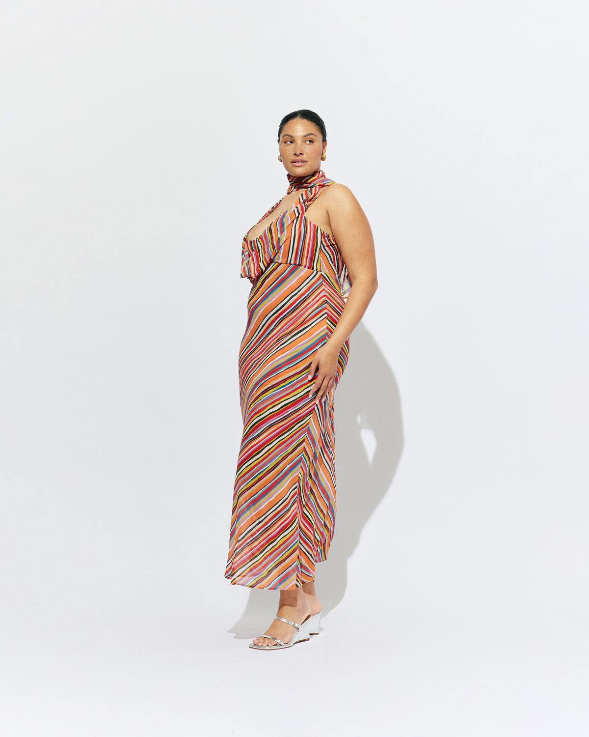 RILEY SASH DRESS LIQUORICE STRIPE | Bias cut maxi dress designed in a liquorice stripe chiffon. This dress features a built in bust panel that you can wear around the neck as a scarf, tied at the back, or over the shoulders for a cowl neck...