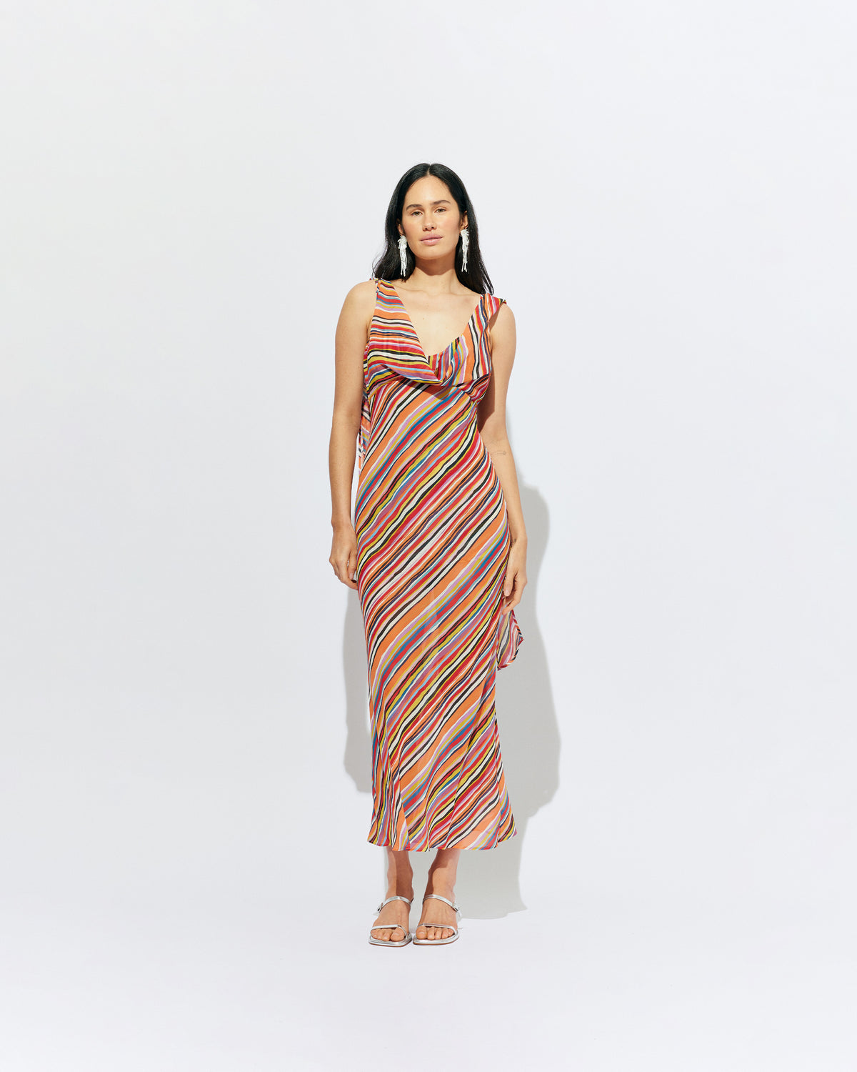 RILEY SASH DRESS LIQUORICE STRIPE | Bias cut maxi dress designed in a liquorice stripe chiffon. This dress features a built in bust panel that you can wear around the neck as a scarf, tied at the back, or over the shoulders for a cowl neck...