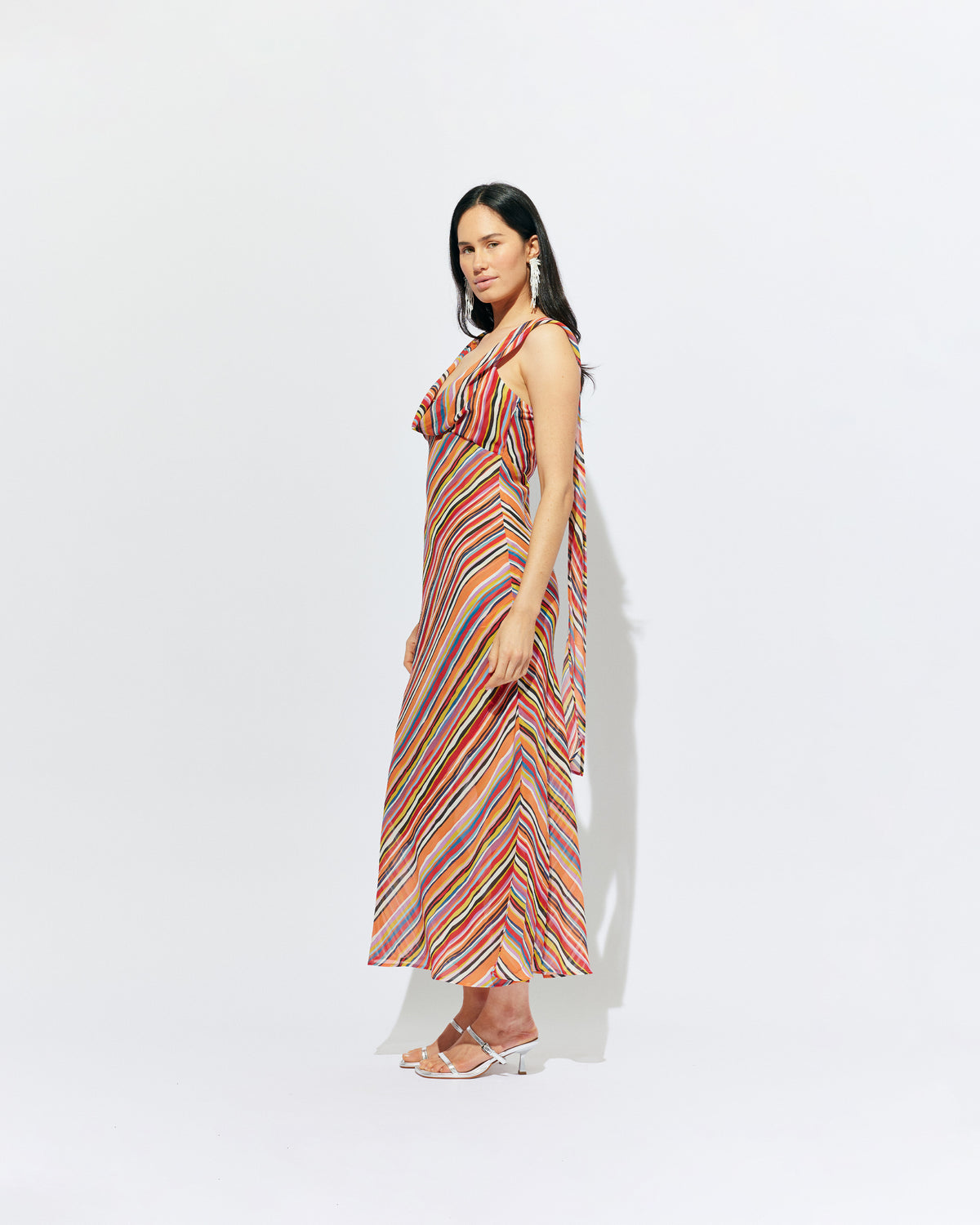 RILEY SASH DRESS LIQUORICE STRIPE | Bias cut maxi dress designed in a liquorice stripe chiffon. This dress features a built in bust panel that you can wear around the neck as a scarf, tied at the back, or over the shoulders for a cowl neck...