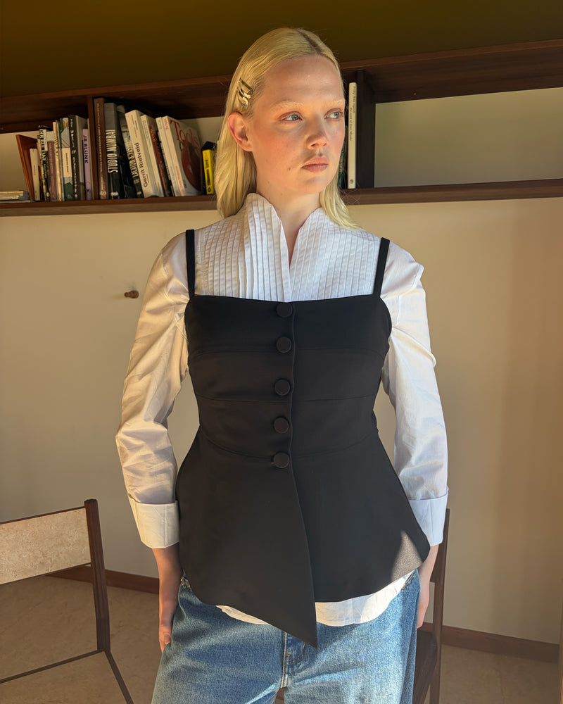 COCO BODICE BLACK | Your new workwear staple, this bodice features a soft peplum silhouette and buttoned front, designed in a mid-weight black suiting fabric. Wear as a layer over the Casper Tuxedo Shirt, or with the Coco Blazer for the ultimate workwear set.