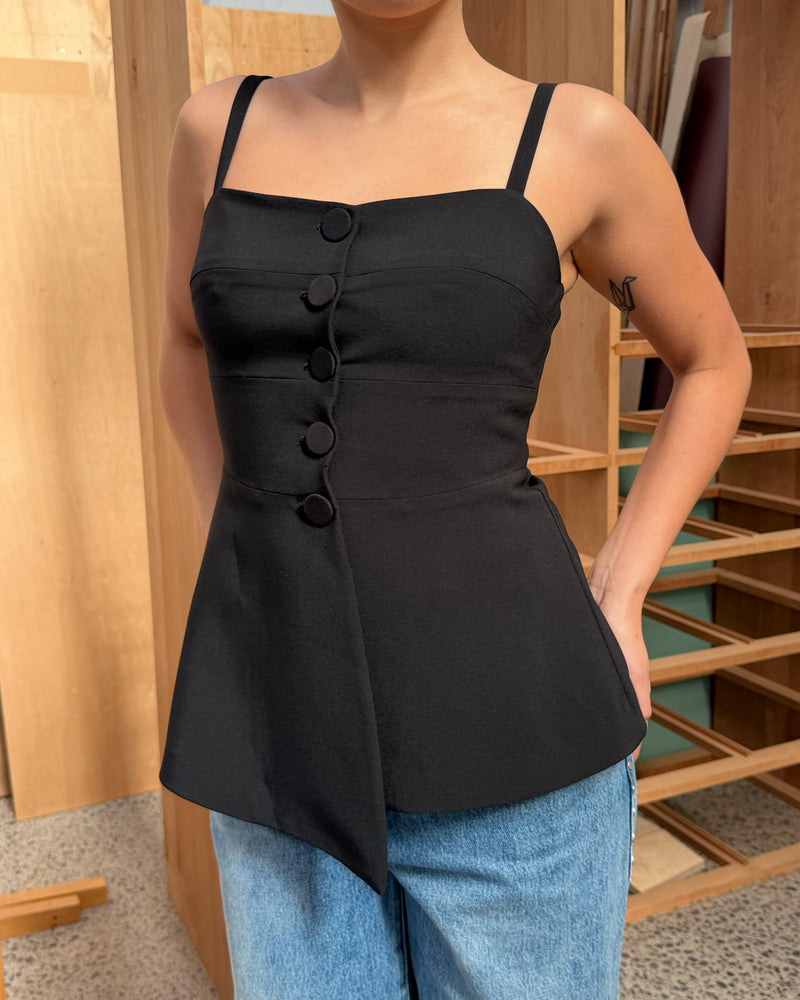 COCO BODICE BLACK | Your new workwear staple, this bodice features a soft peplum silhouette and buttoned front, designed in a mid-weight black suiting fabric. Wear as a layer over the Casper Tuxedo Shirt, or with the Coco Blazer for the ultimate workwear set.