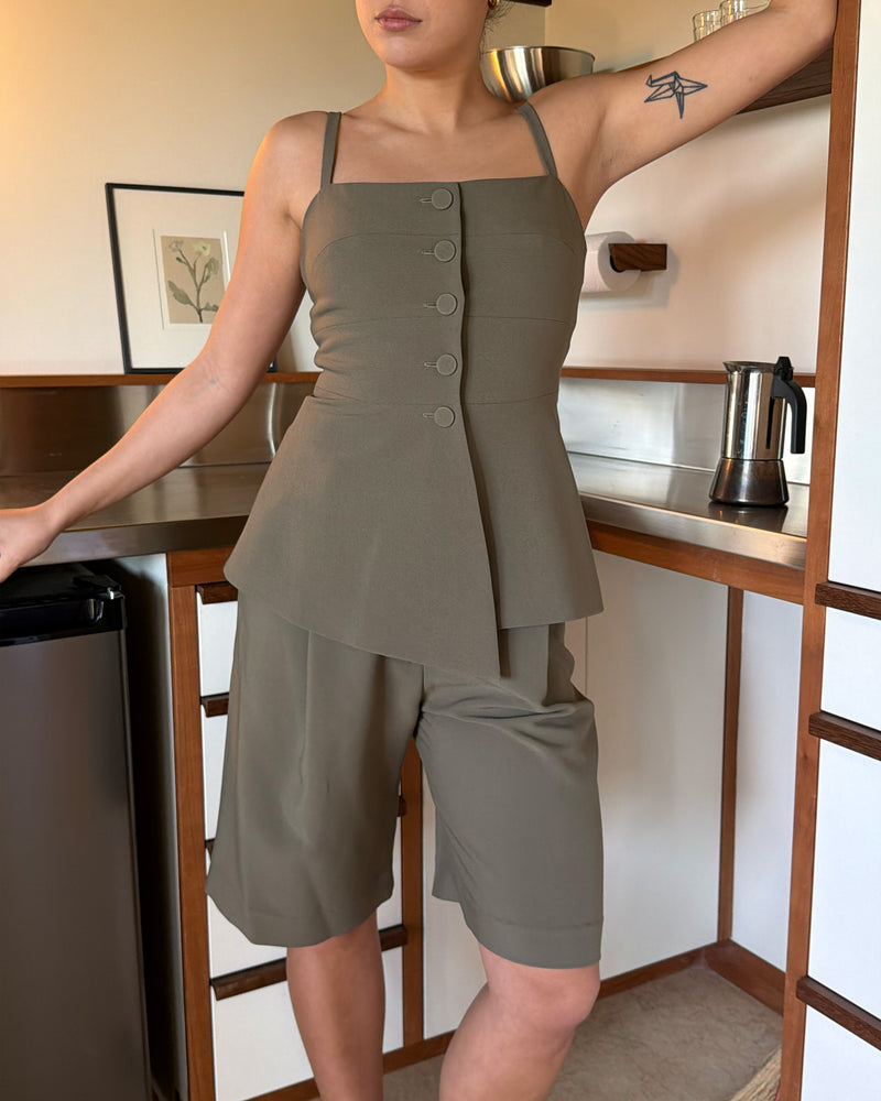 COCO BODICE MARTINI OLIVE | Your new workwear staple, this bodice features a soft peplum silhouette and buttoned front, designed in a mid-weight martini olive suiting fabric. Wear as a layer over the Casper Tuxedo Shirt, or pair with the Coco Blazer and Coco Suit...