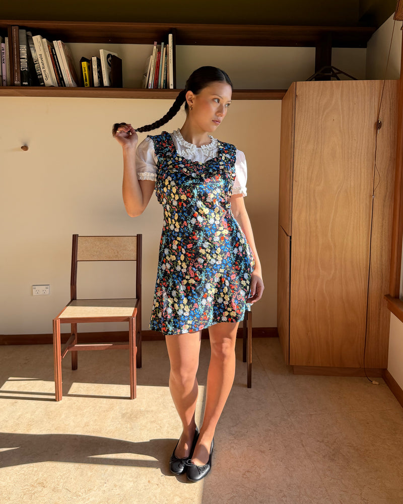 PASSIONFRUIT MINI DRESS SPRINKLE FLORAL | Mini slip dress with ruffle details, designed in our colourful sprinkle floral print. With a soft vintage look, this is the perfect light-weight summer dress, or a cute layering piece for cooler weather. 