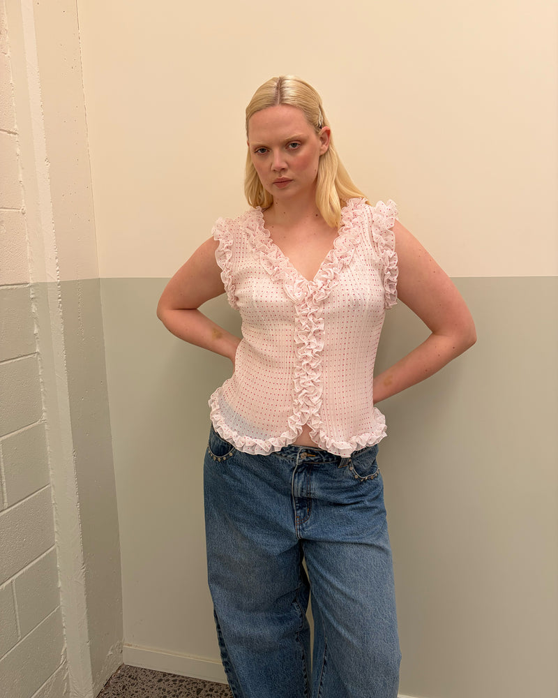 CHELSEA CRINKLE TANK POLKA DOT | An update on our Chelsea Crinkle Top, this pink polka dot recycled chiffon tank features ruffles along all the seams. This top is the perfect statement piece for any occasion, from office-wear to a night out. Pair it with your...