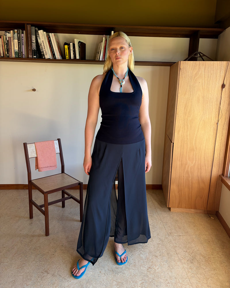 CASETTE PANT NAVY | Vintage inspired pant designed in a luxe navy chiffon. This pant features a floaty over-layer that glides with you as you walk and a high waisted fit. Dress up by adding your favourite blazer, or pair with your favourite tank...